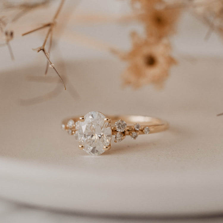 Delicate Accented Oval Cut Engagement Ring