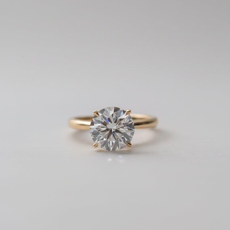 2.5 carat solitaire tiffany classic diamond engagement ring in 18k gold 4 claw setting made in cornwall by Ethica Diamonds