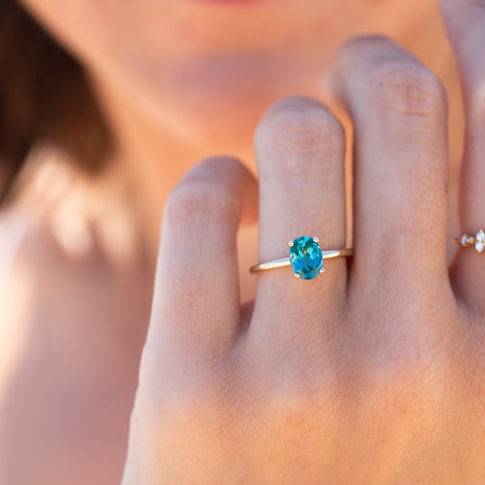 The Alice Ring | 1.50 ct Chatham® Oval Lab Grown Paraiba Spinel Four Claw Solitaire