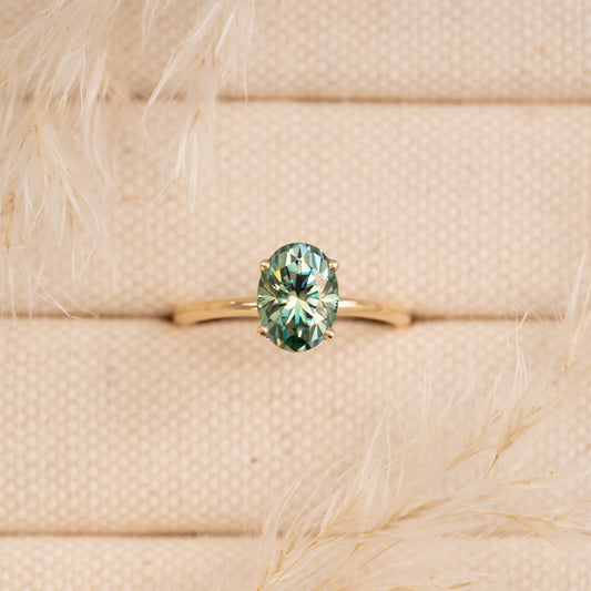 The Alice Ring | Seafoam Green Oval Moissanite Four Claw Solitaire