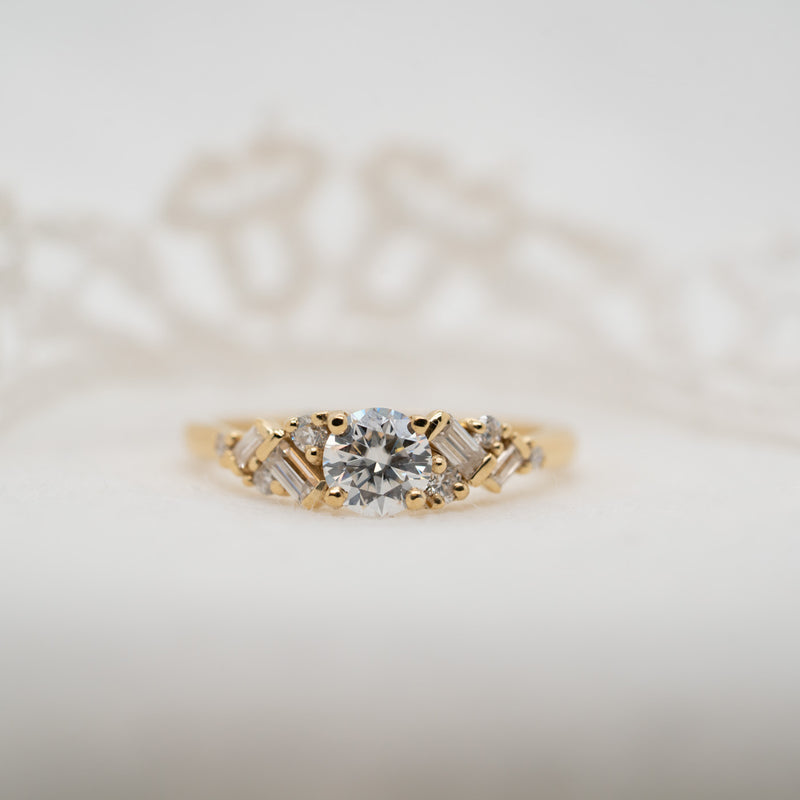 Front view of the Natalia ring, showcasing the round centre stone's brilliant lab grown diamond.