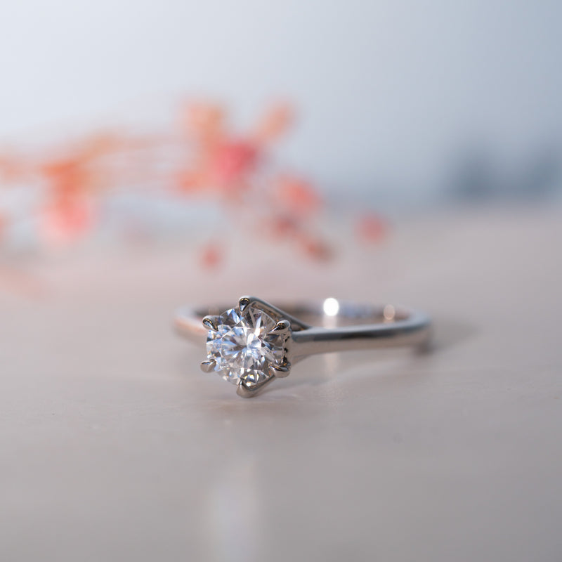 The Molly lab diamond solitaire with a unique criss-cross band design. by Ethica Diamonds.