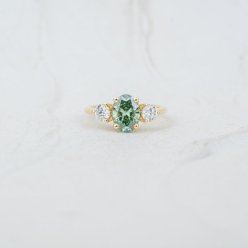 The Tabitha - Coloured Diamond | Oval Moissanite & Lab Diamond Trilogy Ring in Recycled Gold