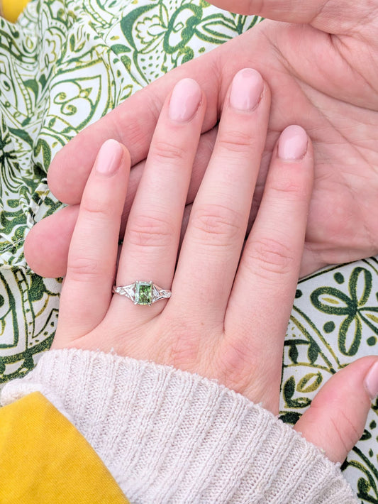 Bespoke green gemstone platinum engagement ring close up - custom commission by Laura at Ethica Diamonds Cornwall