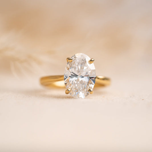 Bespoke Oval Lab Engagement Ring With Hidden Blue Diamond