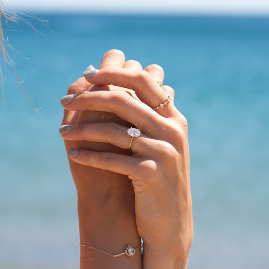 The Penelope Ring worn on hand - platinum oval lab grown diamond engagement ring Ethica Diamonds Cornwall