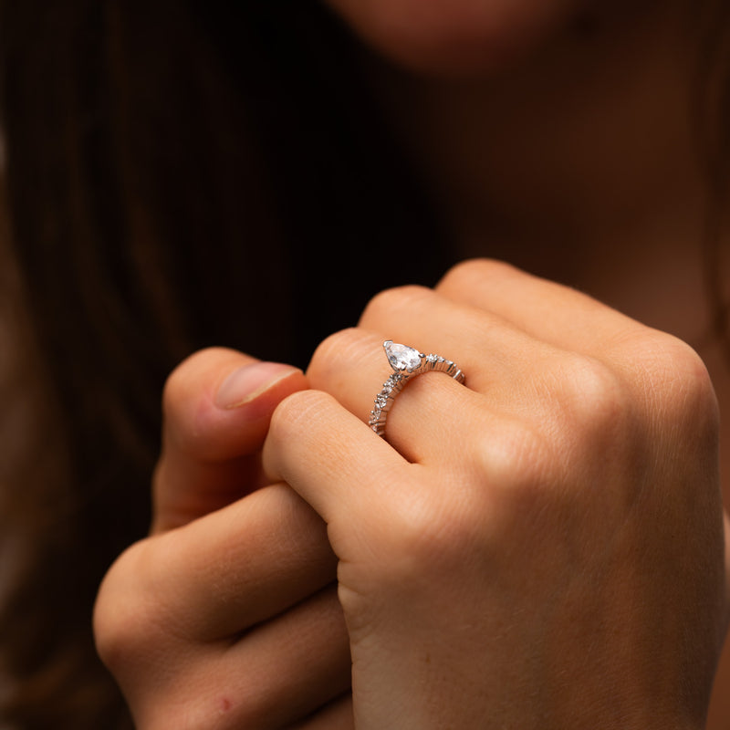 Modern ethically crafted engagement ring with sparkling shoulder accents