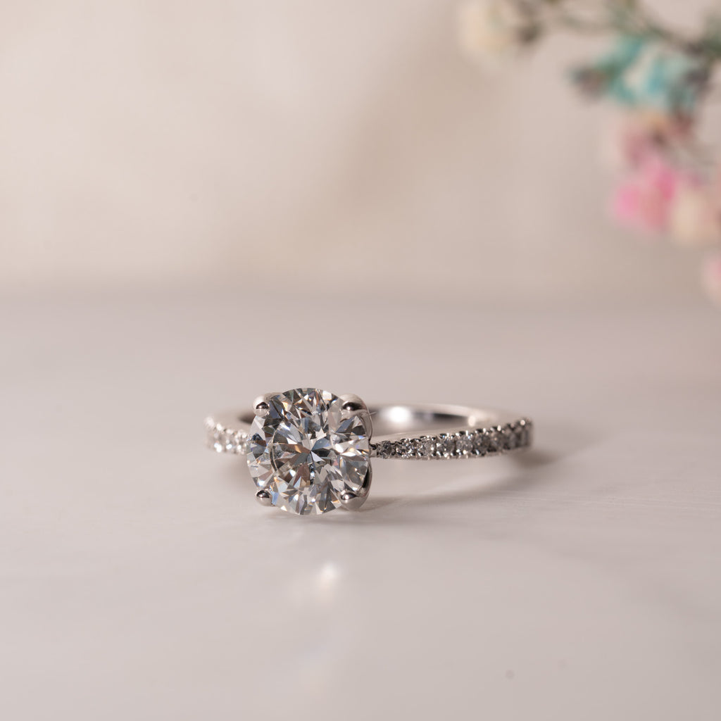 The Afonsa Ring by Ethica Diamonds with lab grown centre diamond and nature-inspired shoulder set