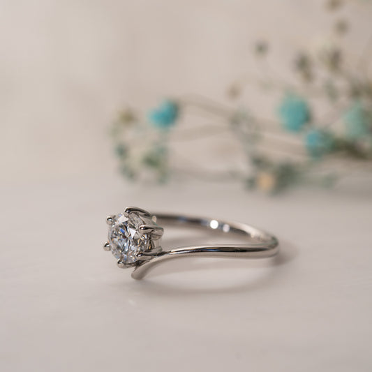 Low set six claw setting engagement ring with round brilliant lab grown diamond