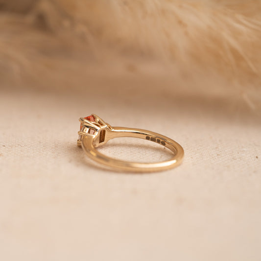 Vintage inspired gold engagement ring with pink and clear lab diamonds