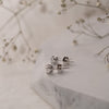 The Aria Earrings | Round Lab Diamond Twist Four Claw Solitaire Studs