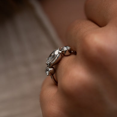 side profile view showing serrated claw edges and bezel setting modern unique engagement rings made in cornwall by ethica diamonds