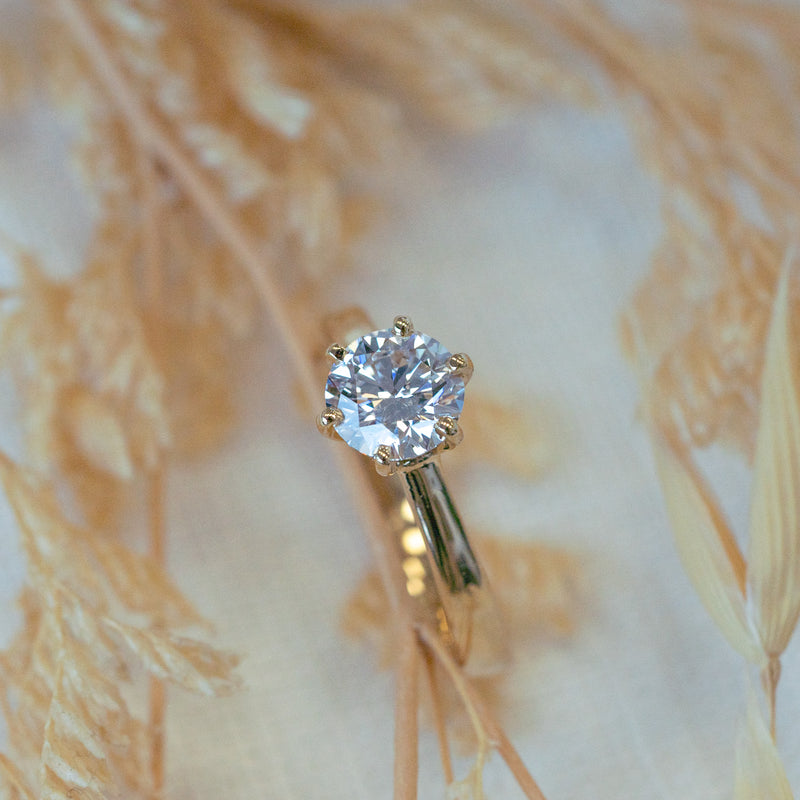 Close up of Athena Ring showcasing classic six claw setting and sparkling lab diamond