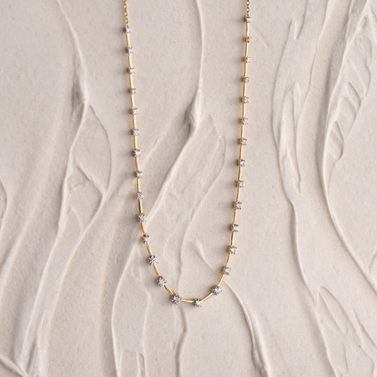 Luxury gold necklace featuring F VS lab-grown diamonds un orbital tennis design