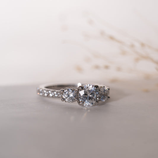 Elegant white gold multistone diamond ring with diamond set band 