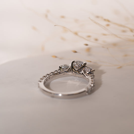 The Beatrix | Round Brilliant Cut Lab Diamond Accented Trilogy Engagement Ring