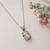 2.0ct classic oval diamond pendant in platinum flat lay on table