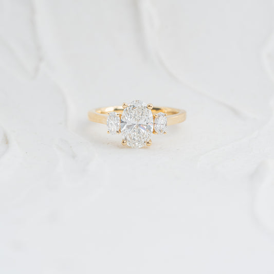 The Cinta | Oval Cut Lab Diamond Trilogy Graduated Engagement Ring