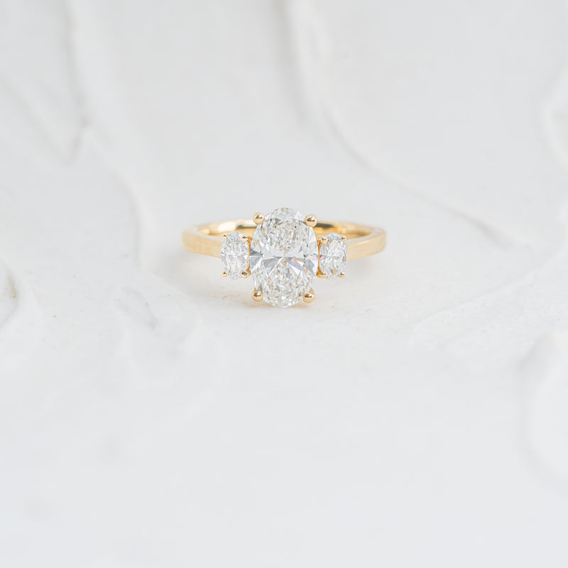 The Cinta | Oval Cut Lab Diamond Trilogy Graduated Engagement Ring