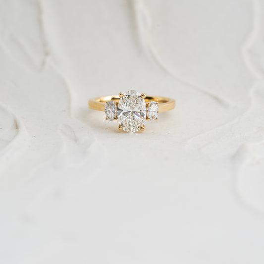The Cinta | Oval Cut Lab Diamond Trilogy Graduated Engagement Ring