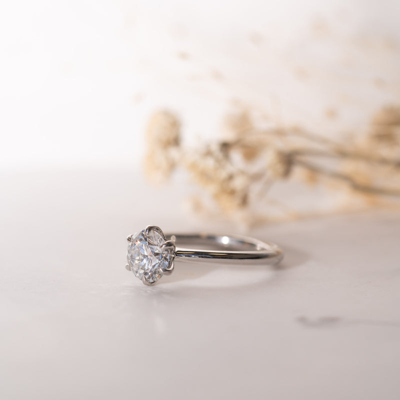 Top view of 1.36ct Cyra Ring displaying round brilliant lab diamond in Tiffany six prong setting