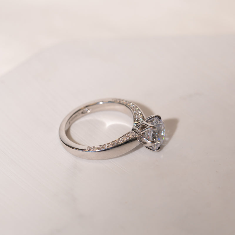 Close-up of The Dion Ring highlighting centre diamond and claw setting