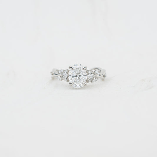 The Eesha | Oval Cut Lab Diamond Accented Twisted Solitaire Engagement Ring