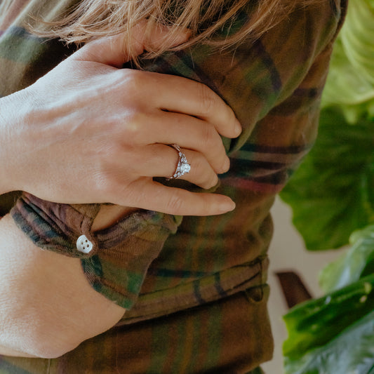 model wearing the eesha by ethica diamonds a nature floral inspired petite twisted vine engagement ring design