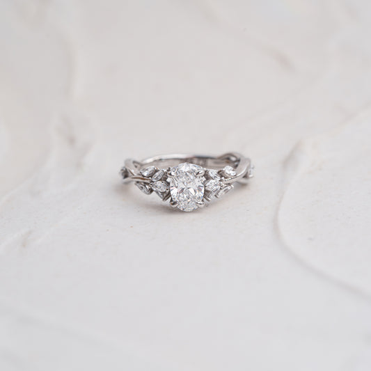 The Eesha | Oval Cut Lab Diamond Accented Twisted Solitaire Engagement Ring