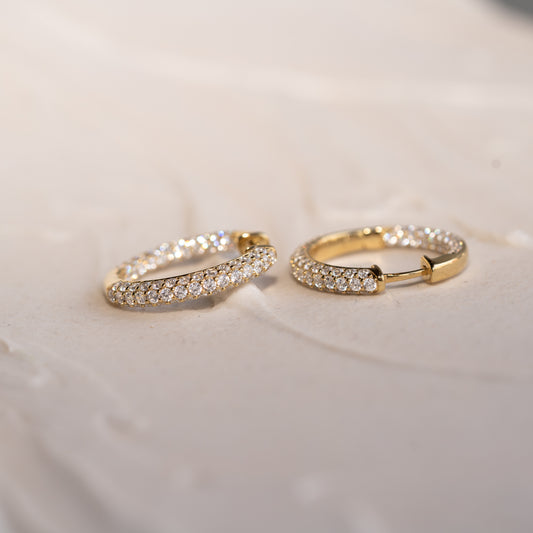 Medium pavé gold earrings with inside-back diamond setting