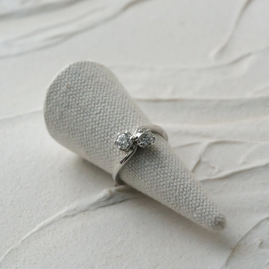 White gold ring with coupled centre diamonds, toi et moi style engagement ring