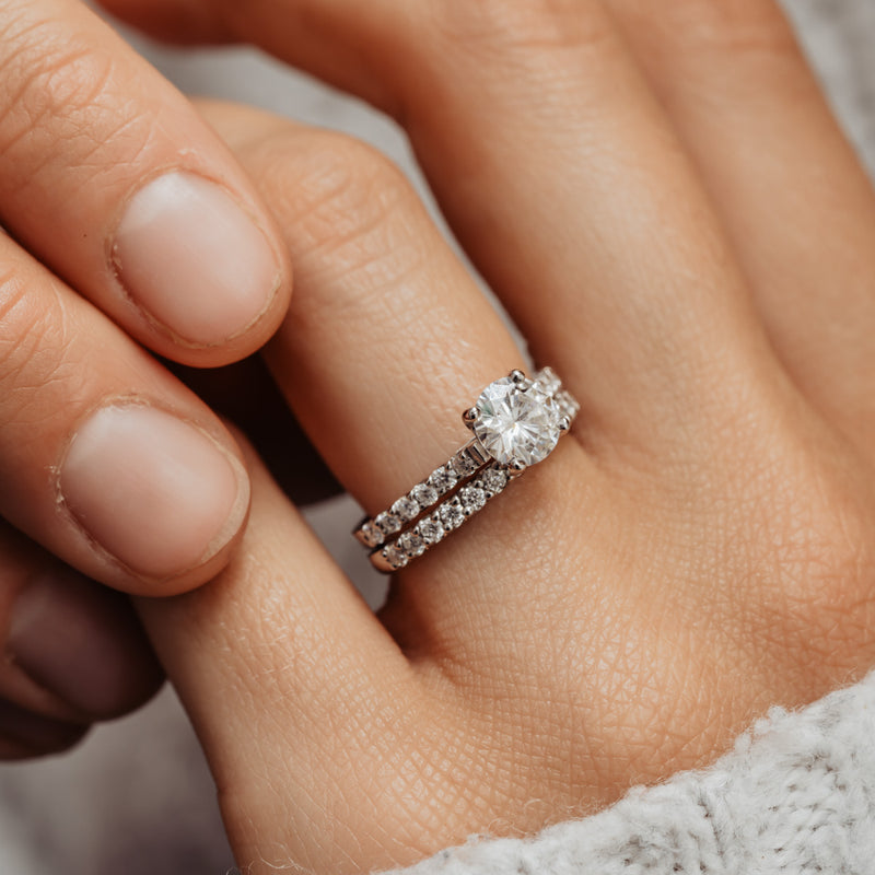 Model wears The Estella by Ethica Diamonds with round brilliant cut lab grown diamond and made in cornwall