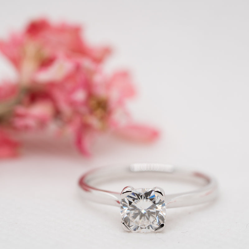 Close-up of The Gabriella Ring by Ethica diamonds open four-claw tulip setting