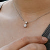 two diamond drop pendant in white gold on neck 1.0ct