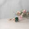 The Evelyn Ring | 2.50ct Emerald Green Moissanite & Trapezoid Lab Diamond Trilogy