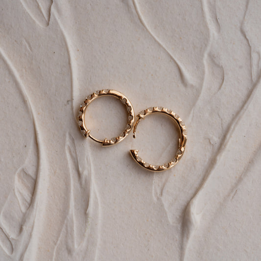 Side view of Evie Gold Diamond Hoops showcasing inside-set diamonds by Ethica Diamonds Cornwall