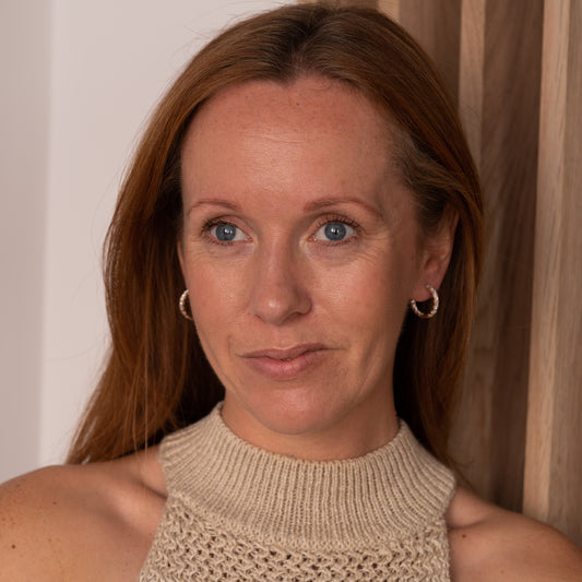 Model wearing Evie Chunky Diamond earrings, sustainably made jewellery. From Cornwall 