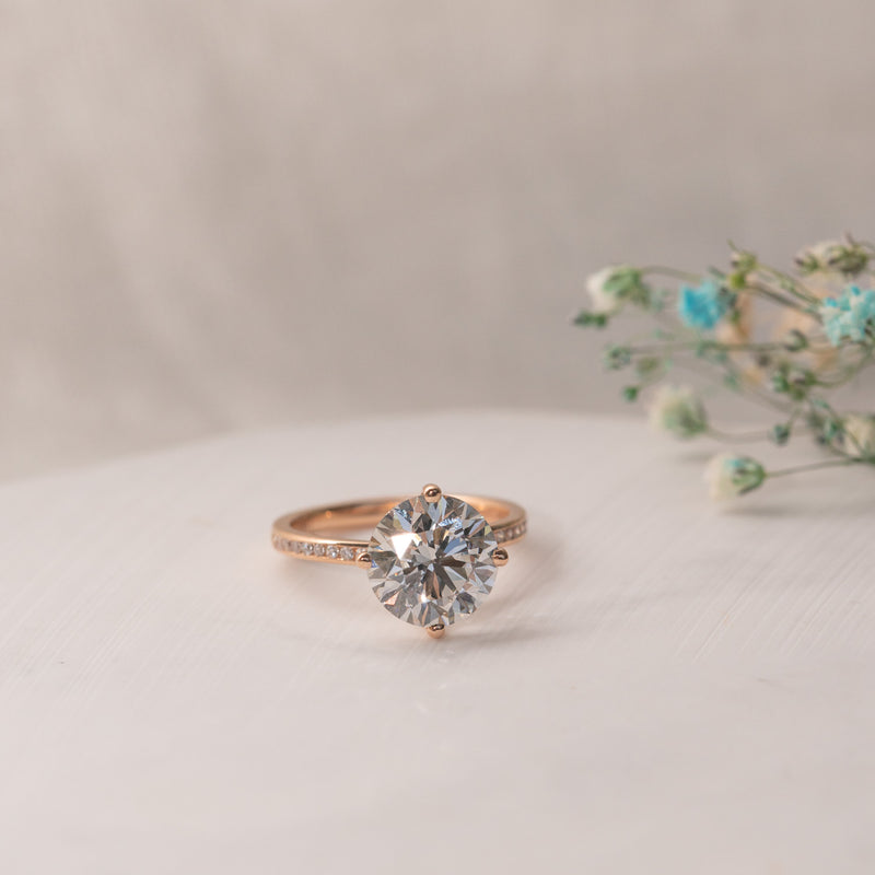 the kerry by ethica diamonds shoulder set diamond ring with new compass setting in recycled gold