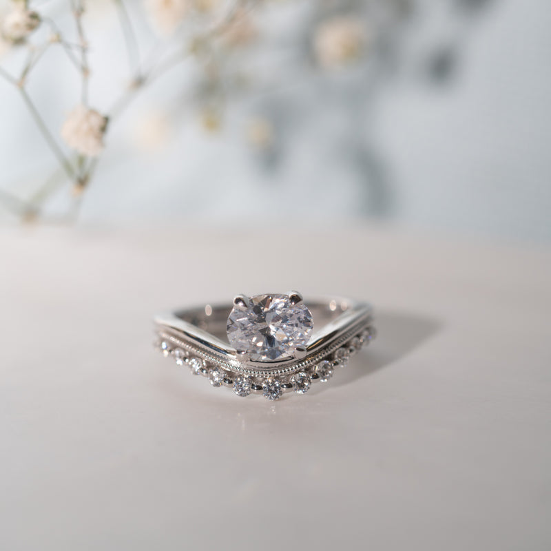 Floating oval lab diamond with milgrain and glittering accents – The Lacey Ring by Ethica Diamonds 