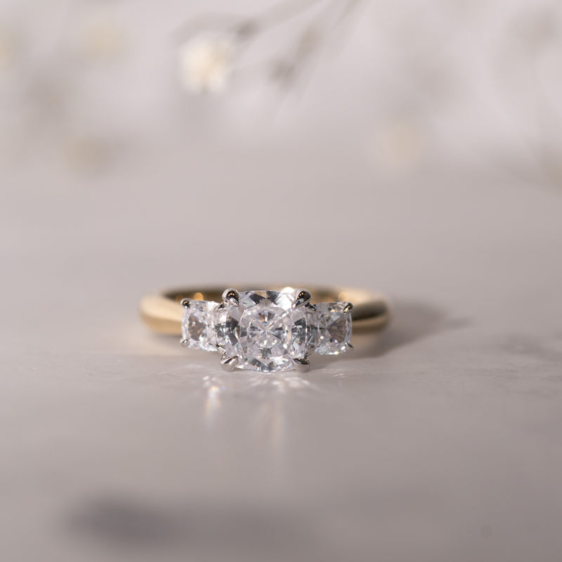 Three-stone cushion lab diamond engagement ring in recycled gold – The Lara Ring