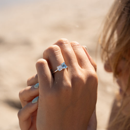 The Marilyn toi et moi ring with ice blue aqua spinel and cushion cut lab grown diamond