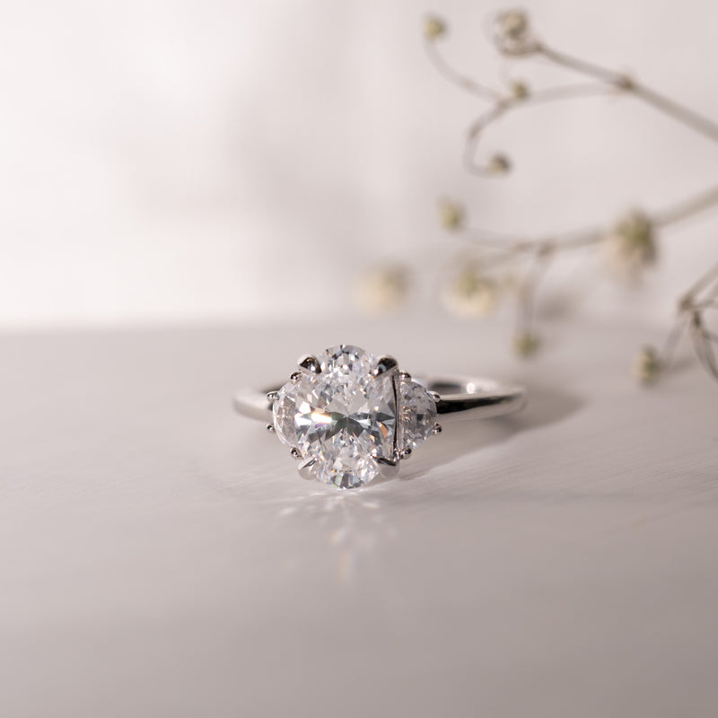 Ethical lab grown diamond engagement ring, oval and half moon trilogy.