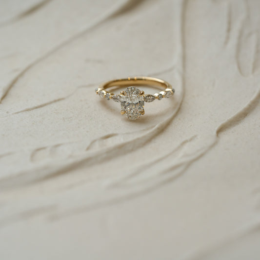 Ethical carbon negative jewellery made in cornwall. Oval, marquise and round cut engagement ring with thin band