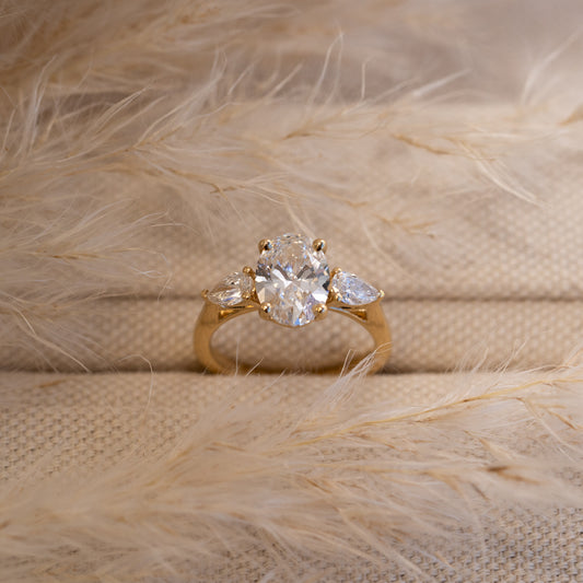 Large oval cut diamond with pear side stones engagement ring jewellery made in  cornwall