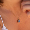 The Ninette Pendant | 2.97ct Round Blue Moissanite & Lab Diamond Halo 9k Yellow Gold