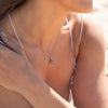 The Ninette Pendant | 2.97ct Round Blue Moissanite & Lab Diamond Halo 9k Yellow Gold