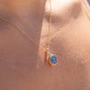 The Ninette Pendant | 2.97ct Round Blue Moissanite & Lab Diamond Halo 9k Yellow Gold