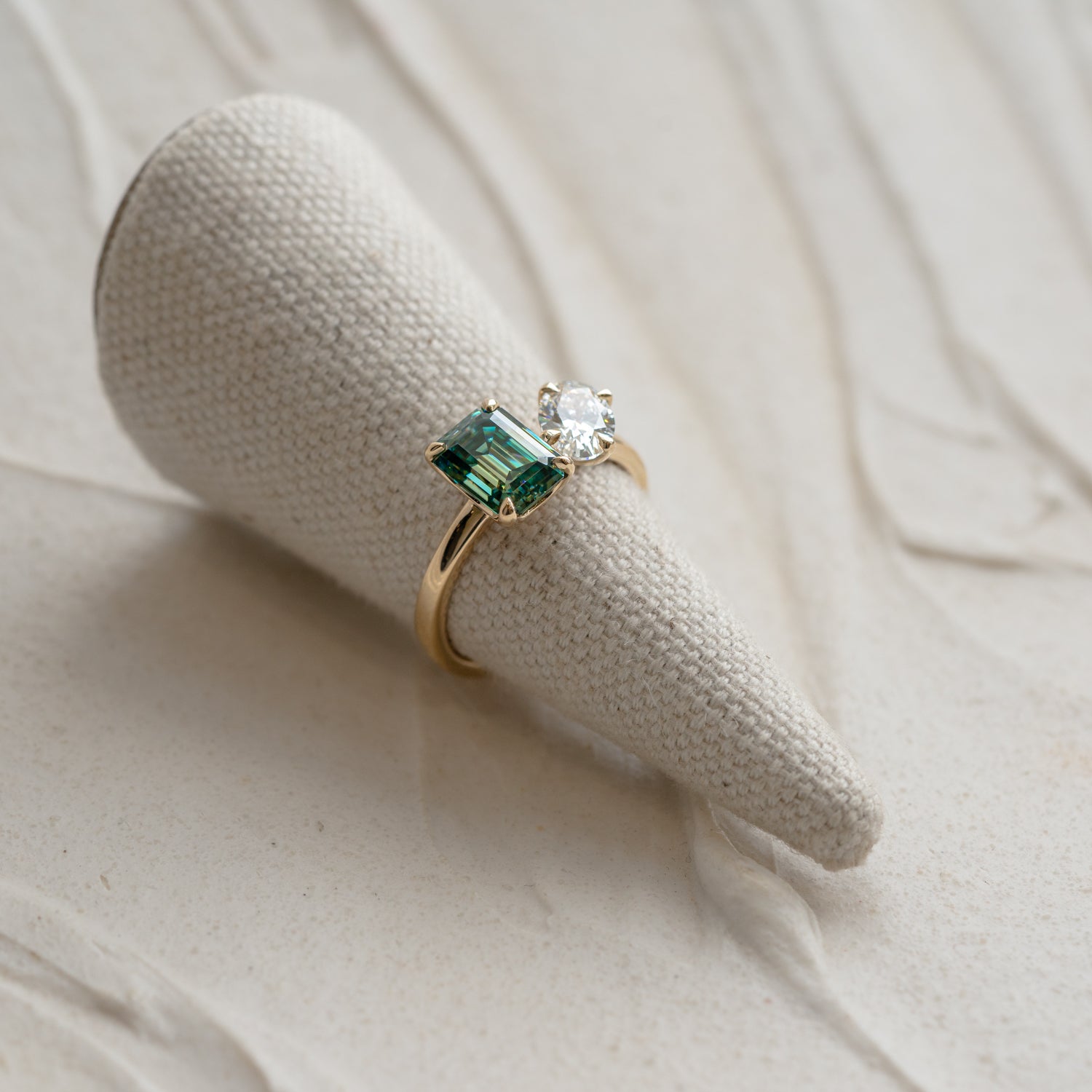 Emerald diamond green and clear lab diamonds set into 18k gold. Ethical and sustainable carbon negative jewellery made in cornwall