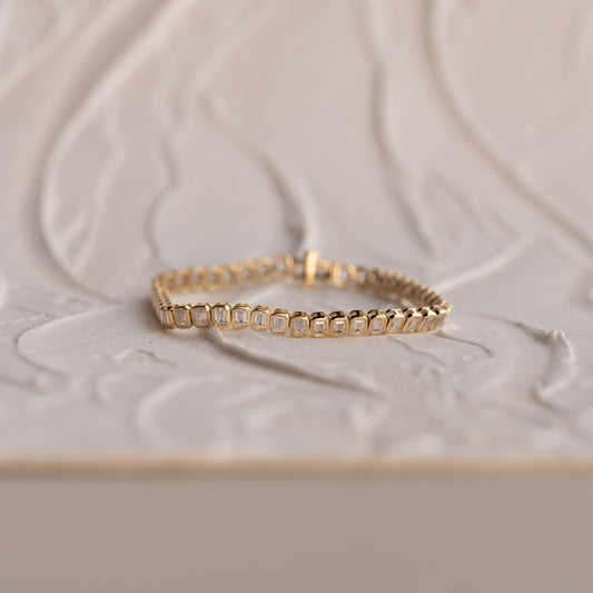 Close-up of emerald-cut diamonds in sleek bezel settings on the Samantha bracelet