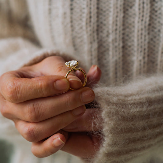 The cira by ethica diamonds features 4ct oval diamond with hidden diamond accents engagement ring